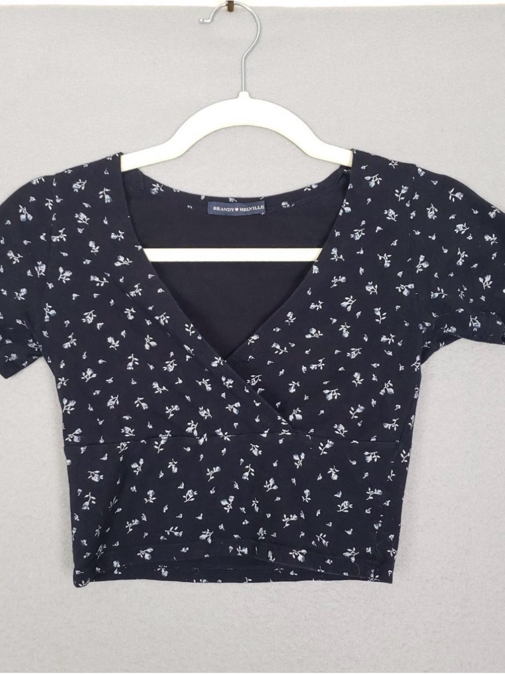 Brandy Melville navy blue floral wrap crop top